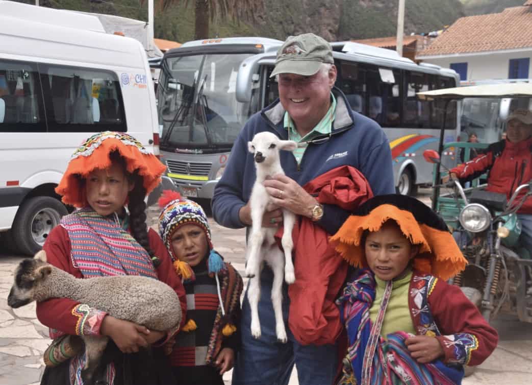 John and a baby llama at Pisac