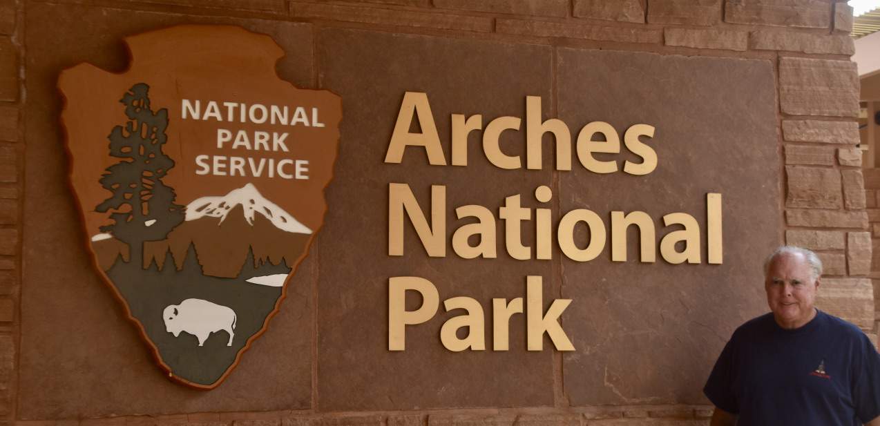 John at the Arches National Park entrance sign