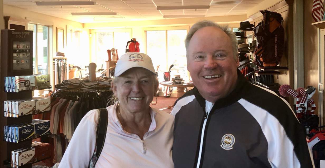 Janice with head pro John Norton