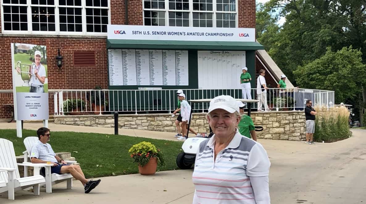 Janice at the scoreboard at Cedar Rapids