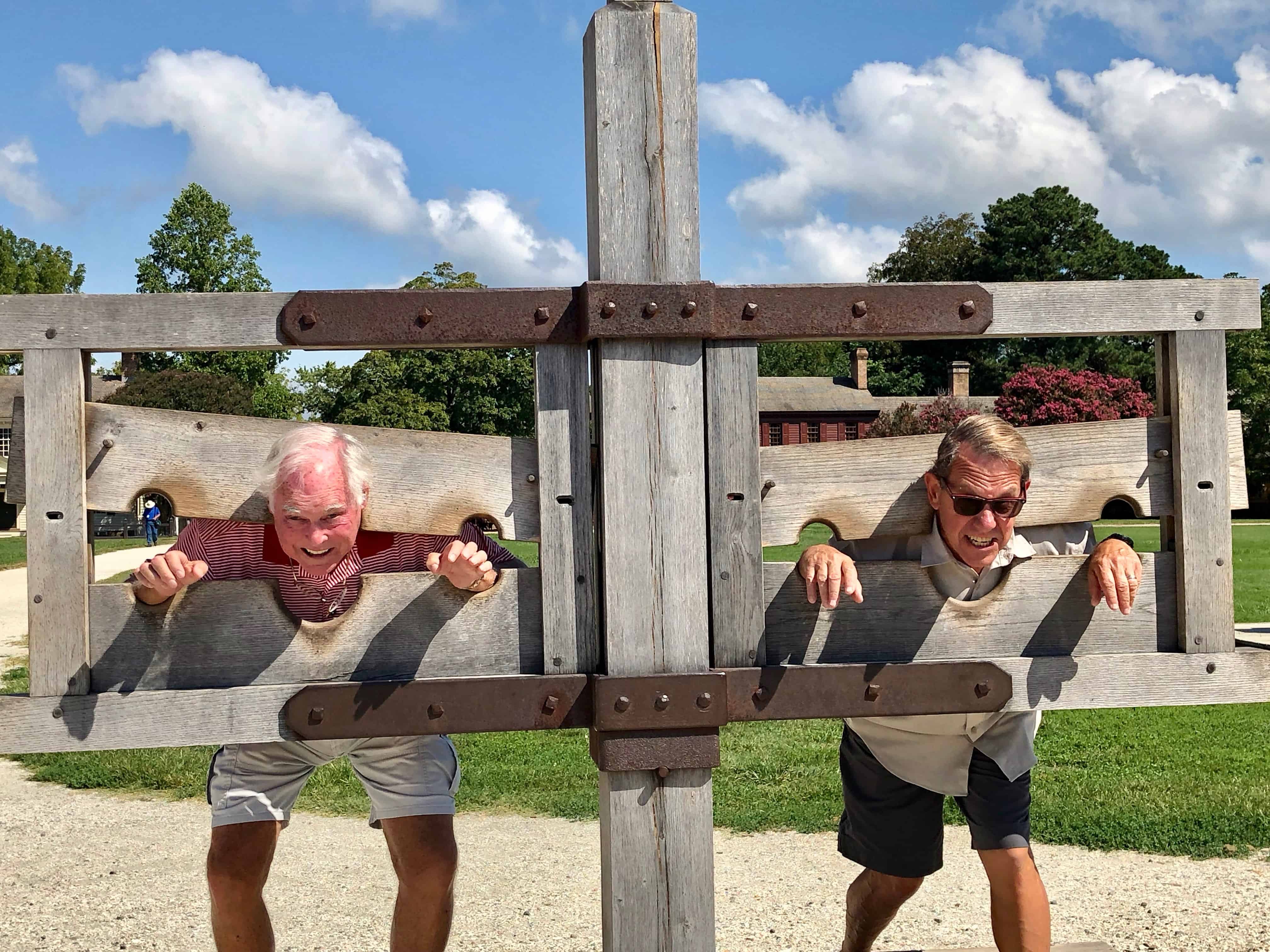 John and Eddie in the stocks, finally caught and punished