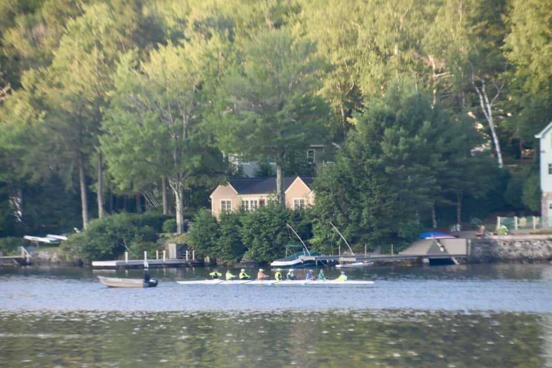 A sculler on the morning lake