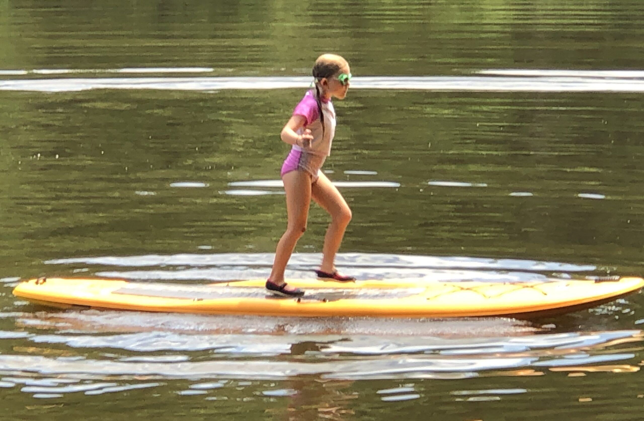 Liza riding the board