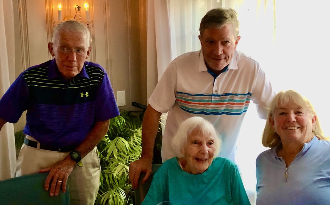 Uncle Bill, Aunt Margaret, cousin Bob, and Janice at dinner