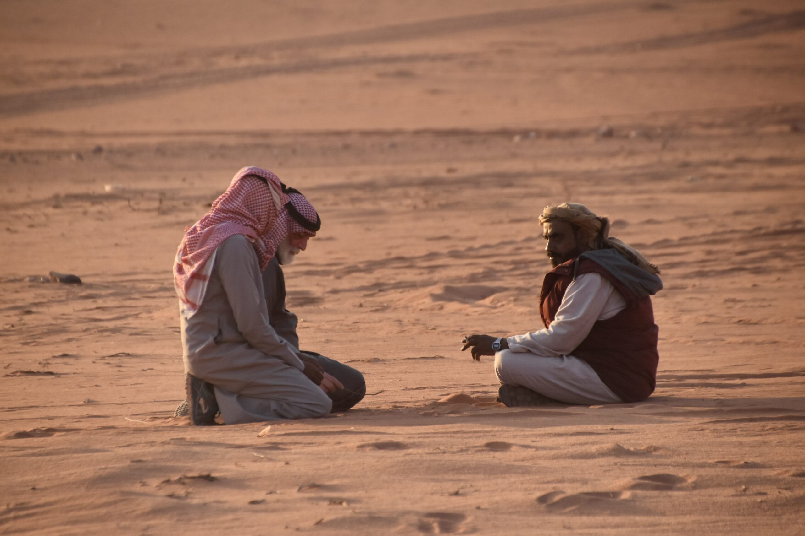The drivers gathered to watch the desert sunset