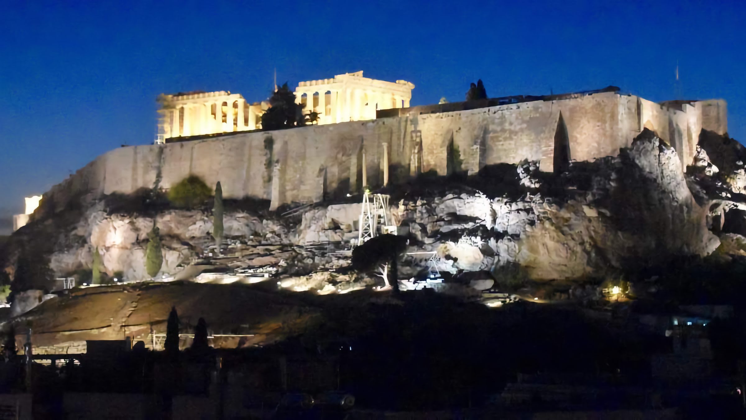 The Acropolis lit up at night in Athens, Greece