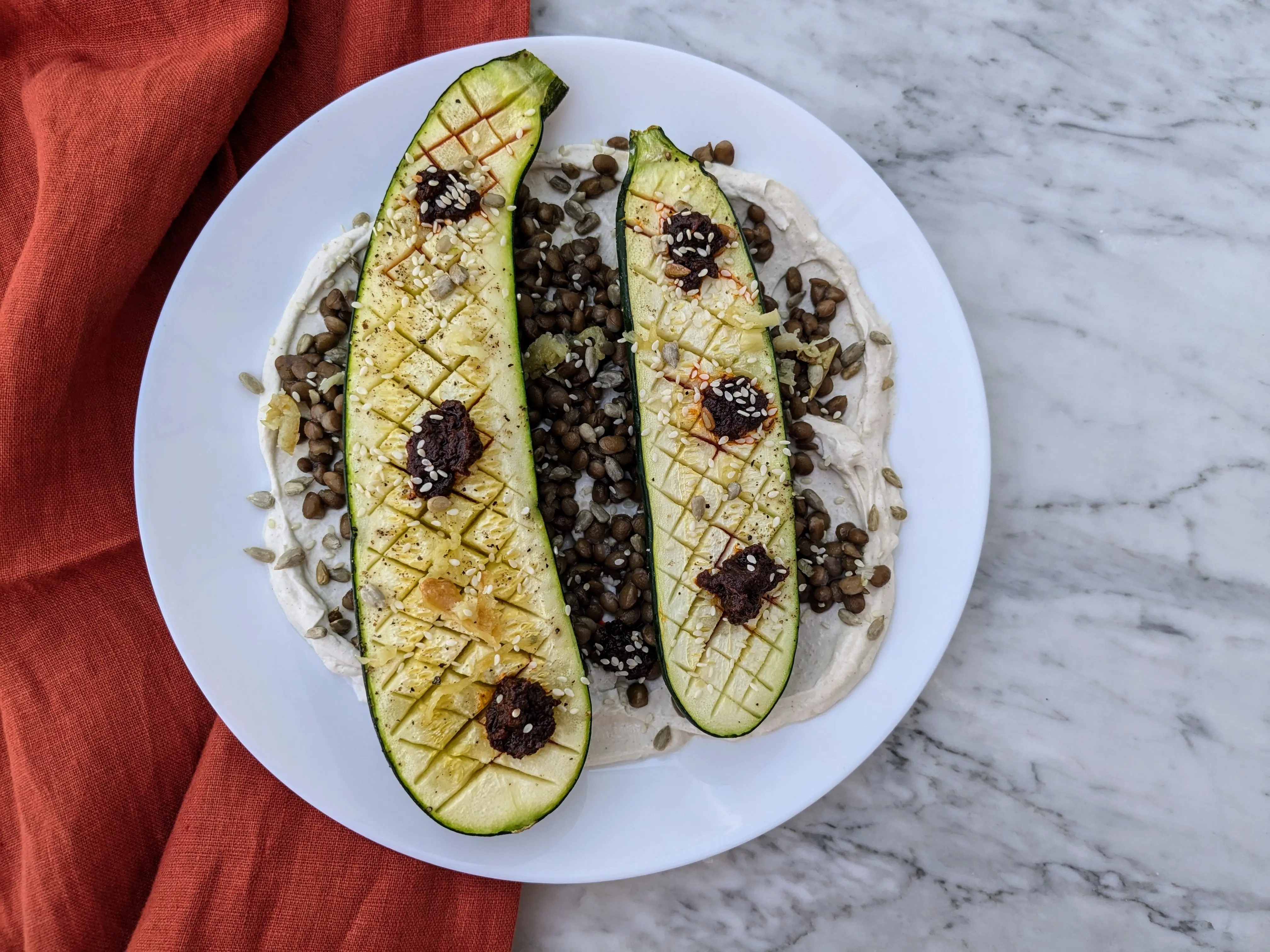 Baked courgette with tahini whipped yoghurt