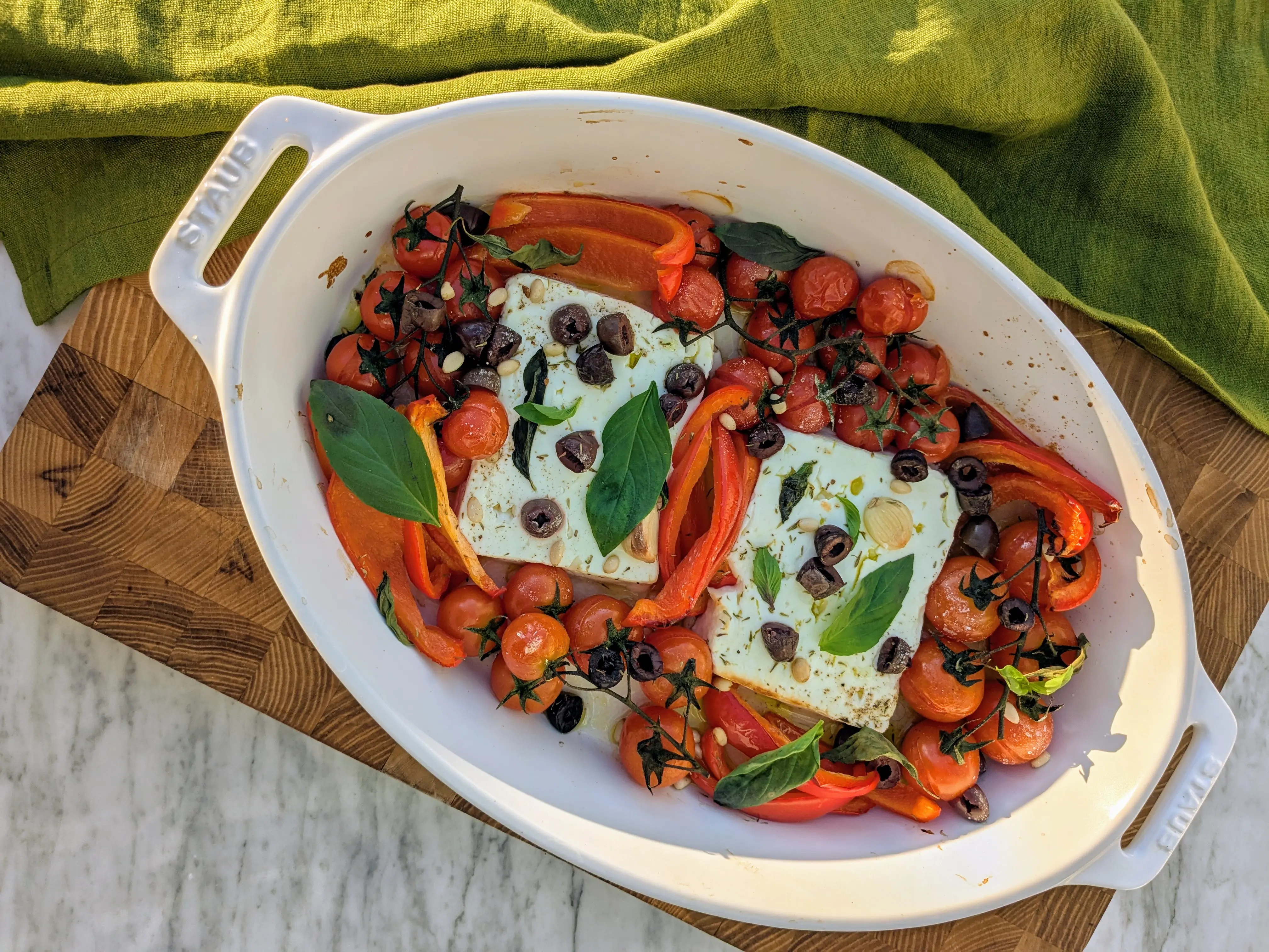 Baked feta with tomatoes, olives and herbs