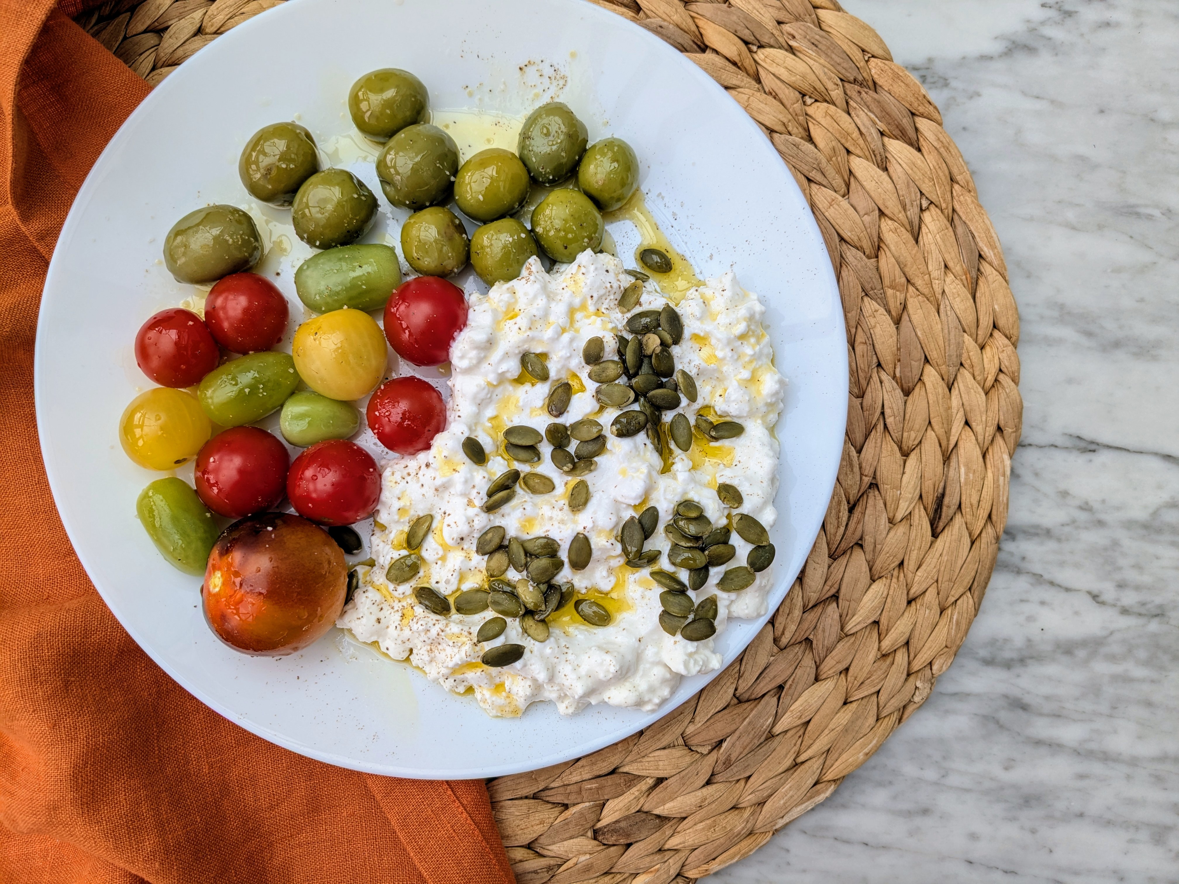 Mediterranean cottage cheese bowl with tomatoes & olives