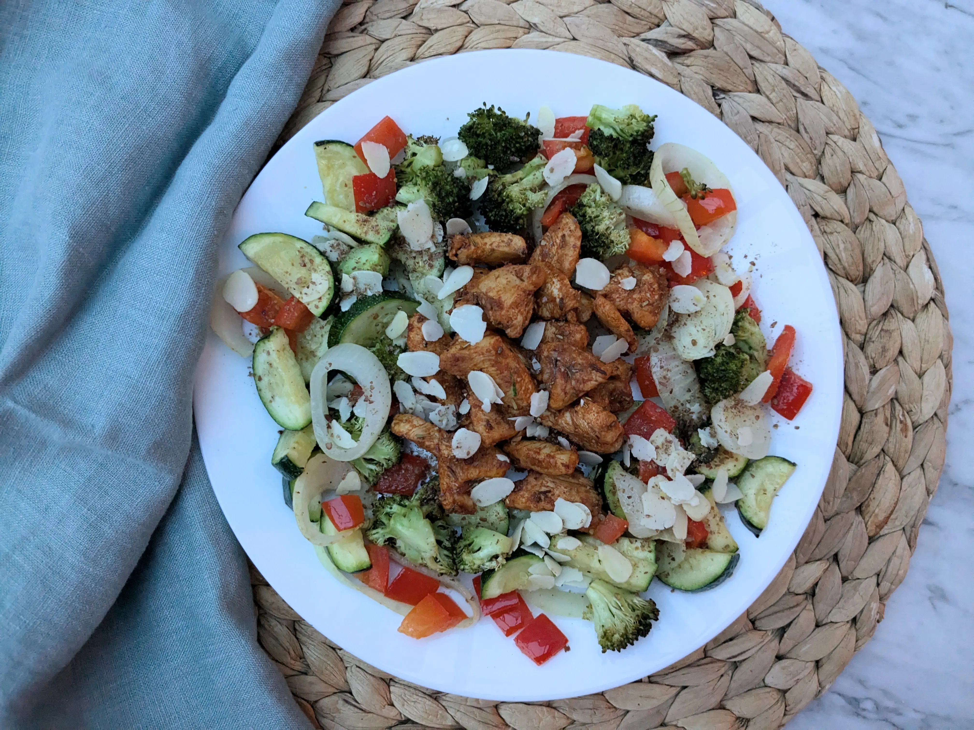 Skillet cooked chicken breast with roasted vegetables