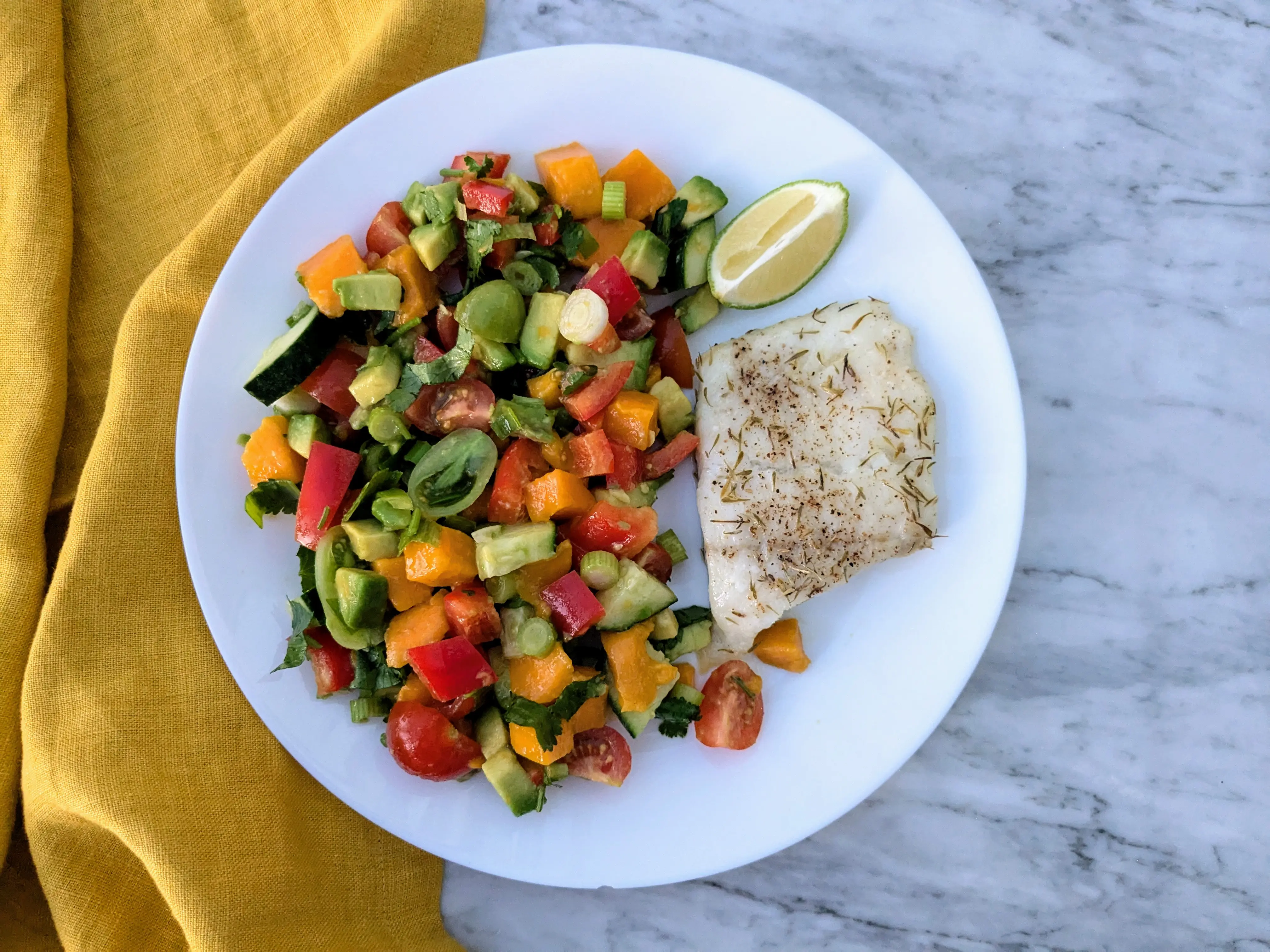 Baked cod with colourful salad