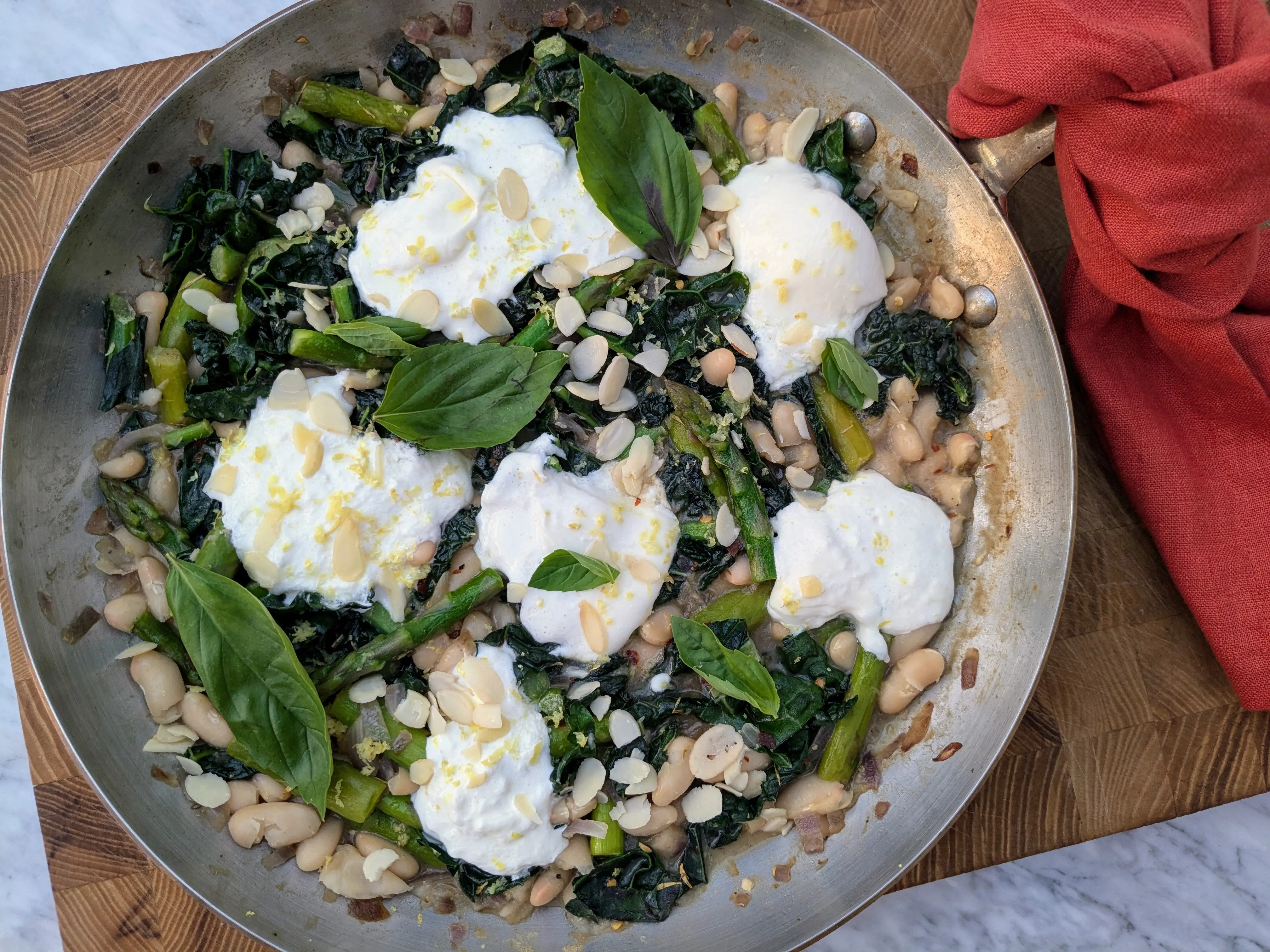 Creamy burrata, cavolo nero and cannellini stew
