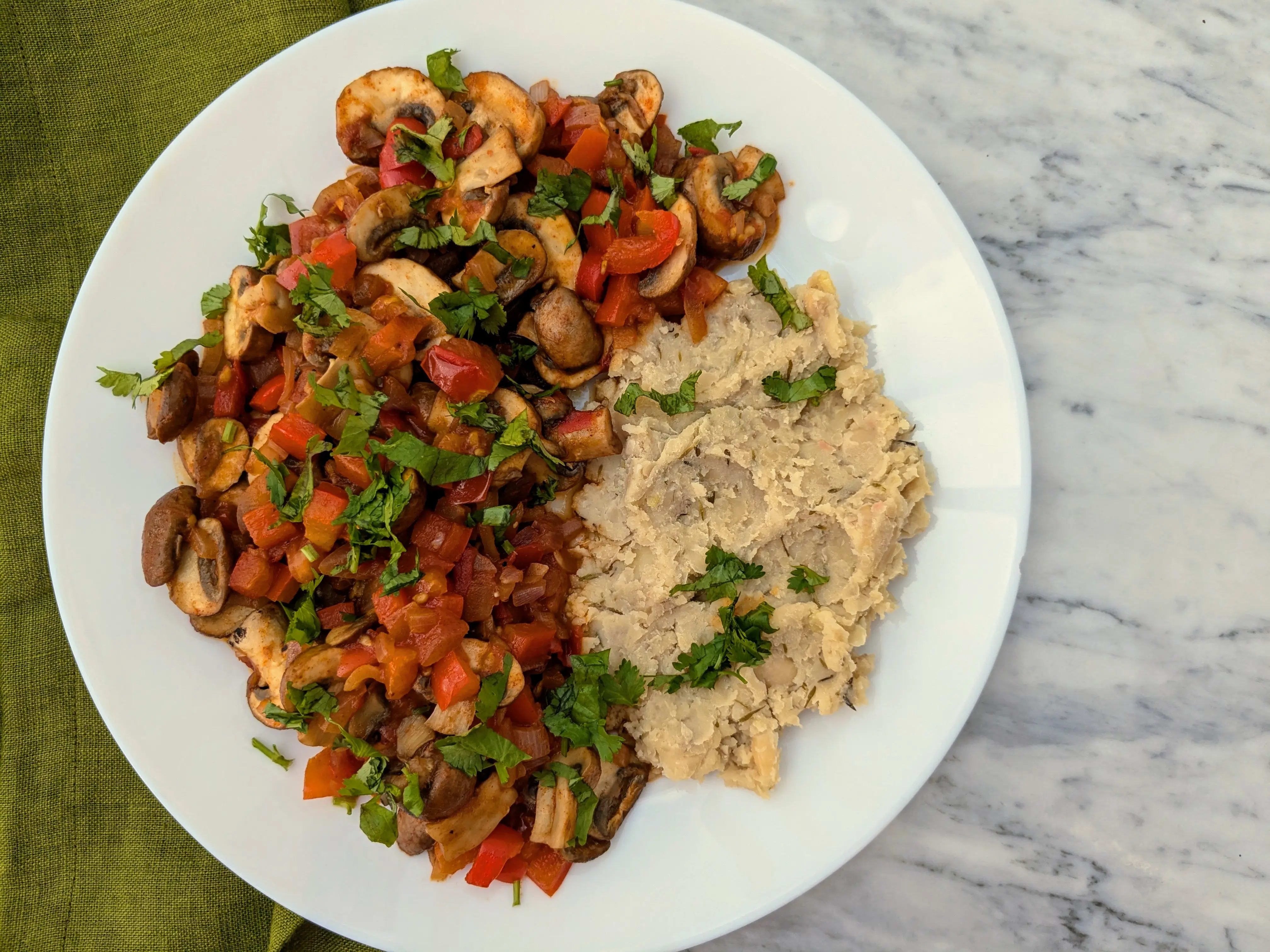 Photo of Vegan mushroom and tomato stew with butter beans mash