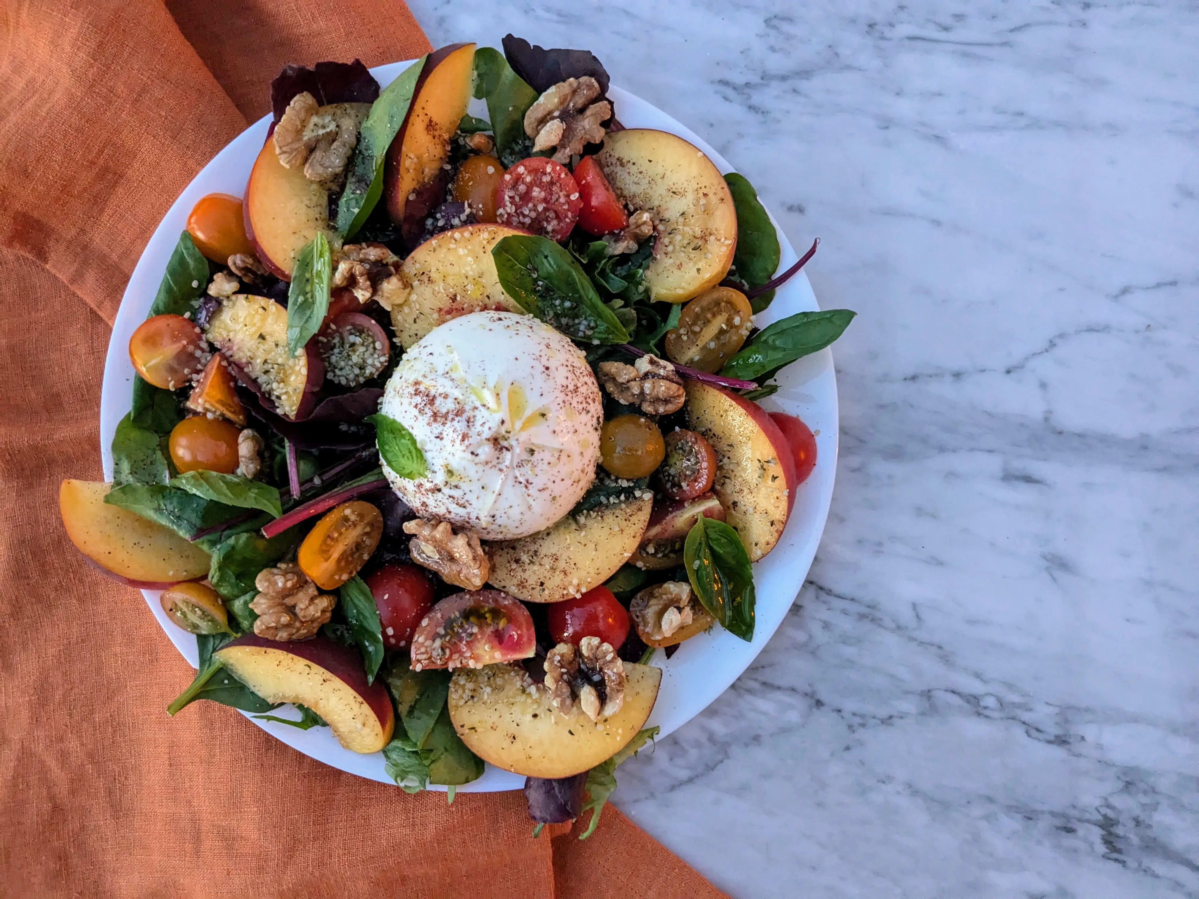 Photo of Summer salad with burrata, tomatoes and peach