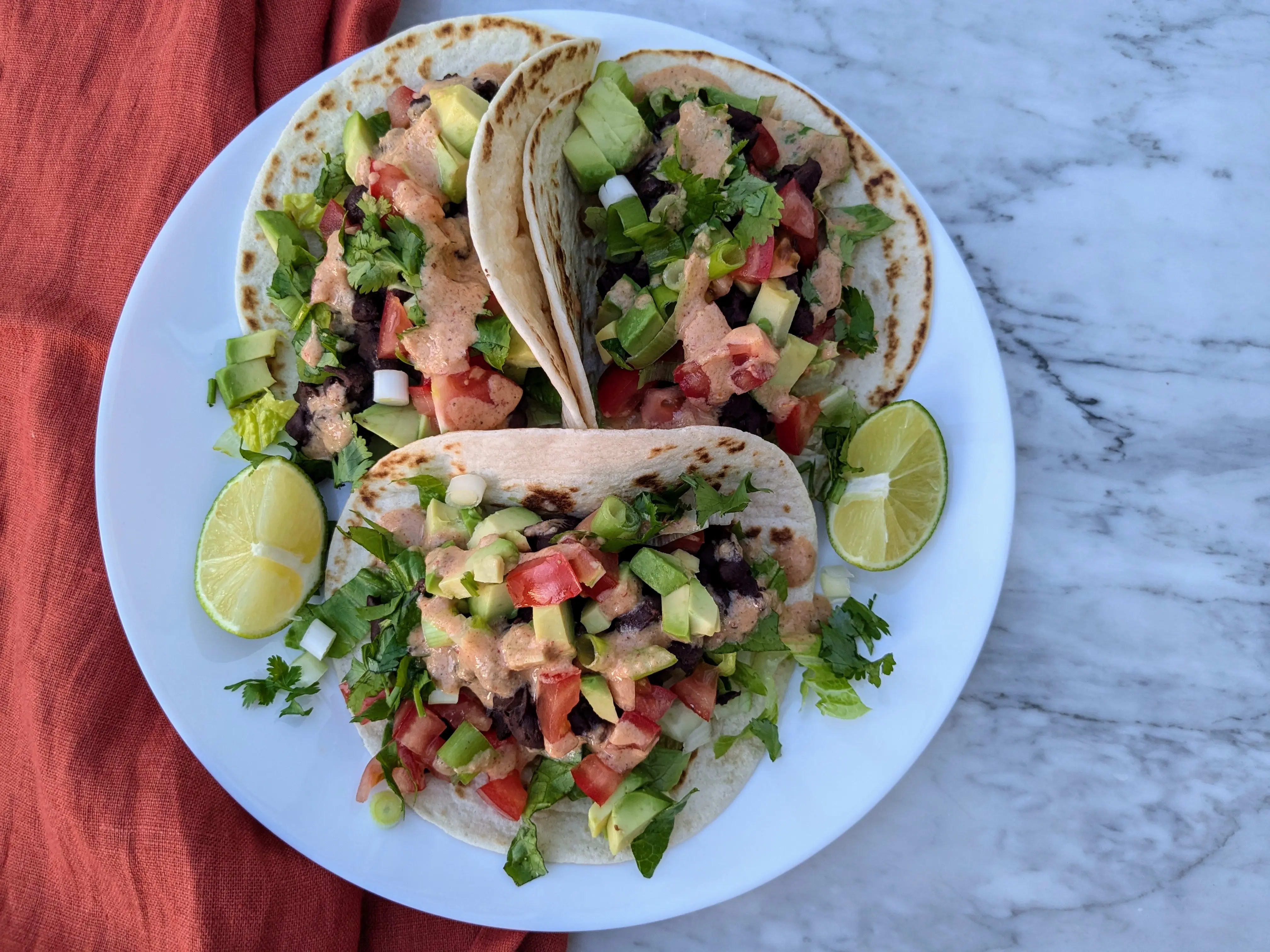 Photo of Vegan black bean and avocado tacos