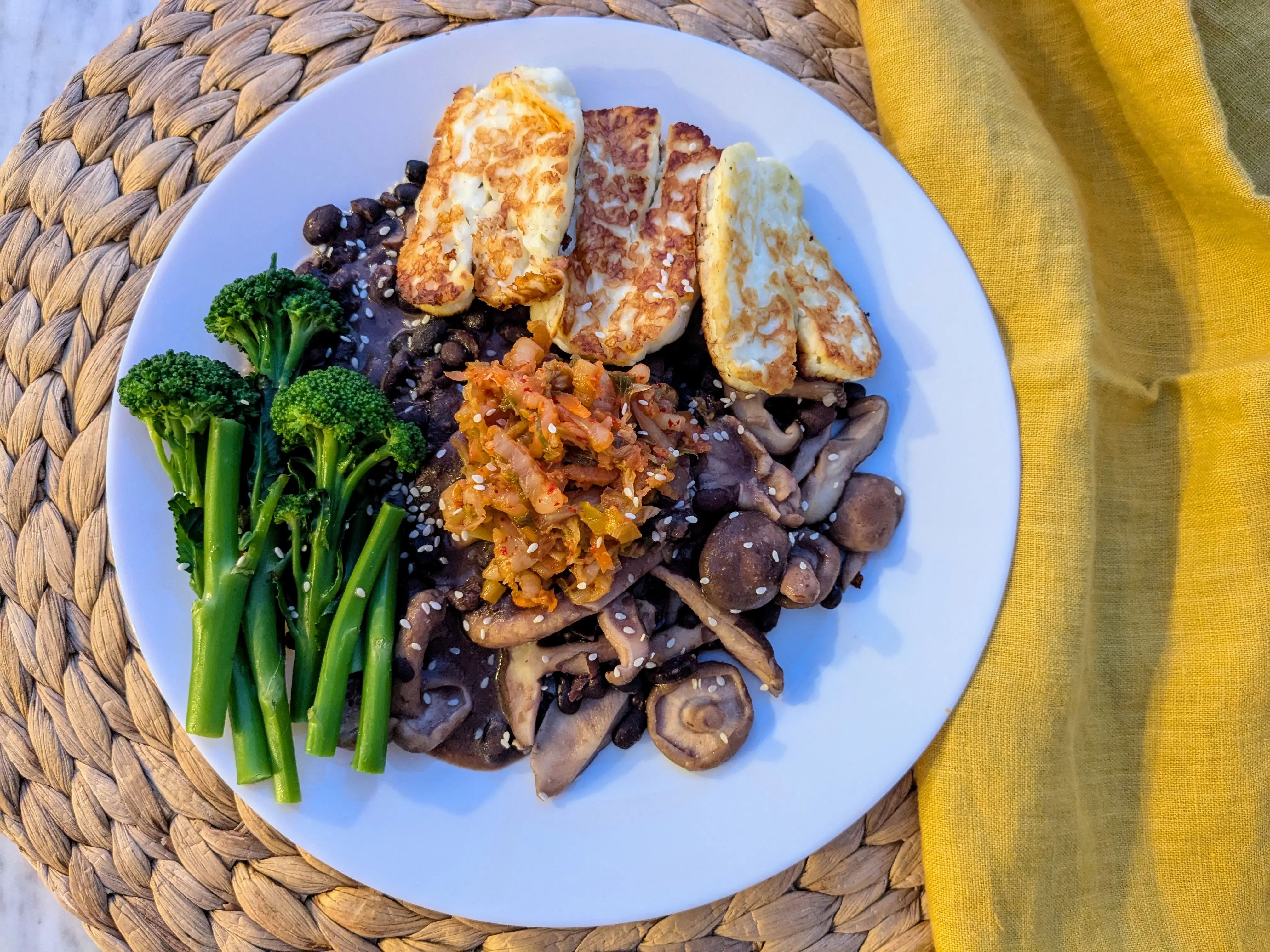 Miso mushroom black beans with grilled halloumi