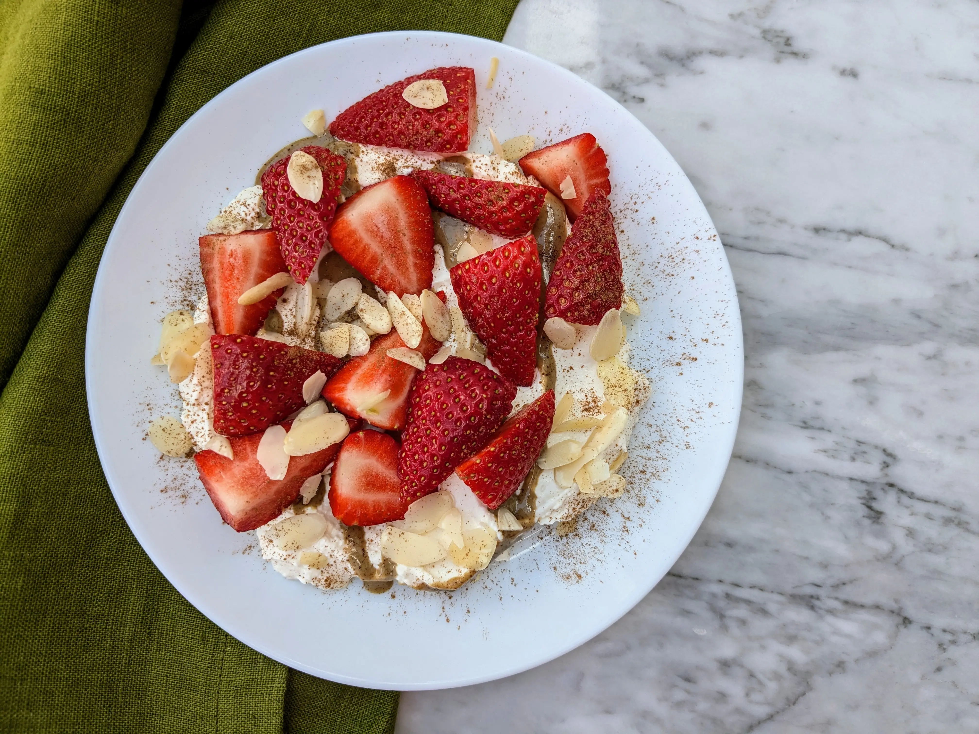 Strawberries with tahini ricotta