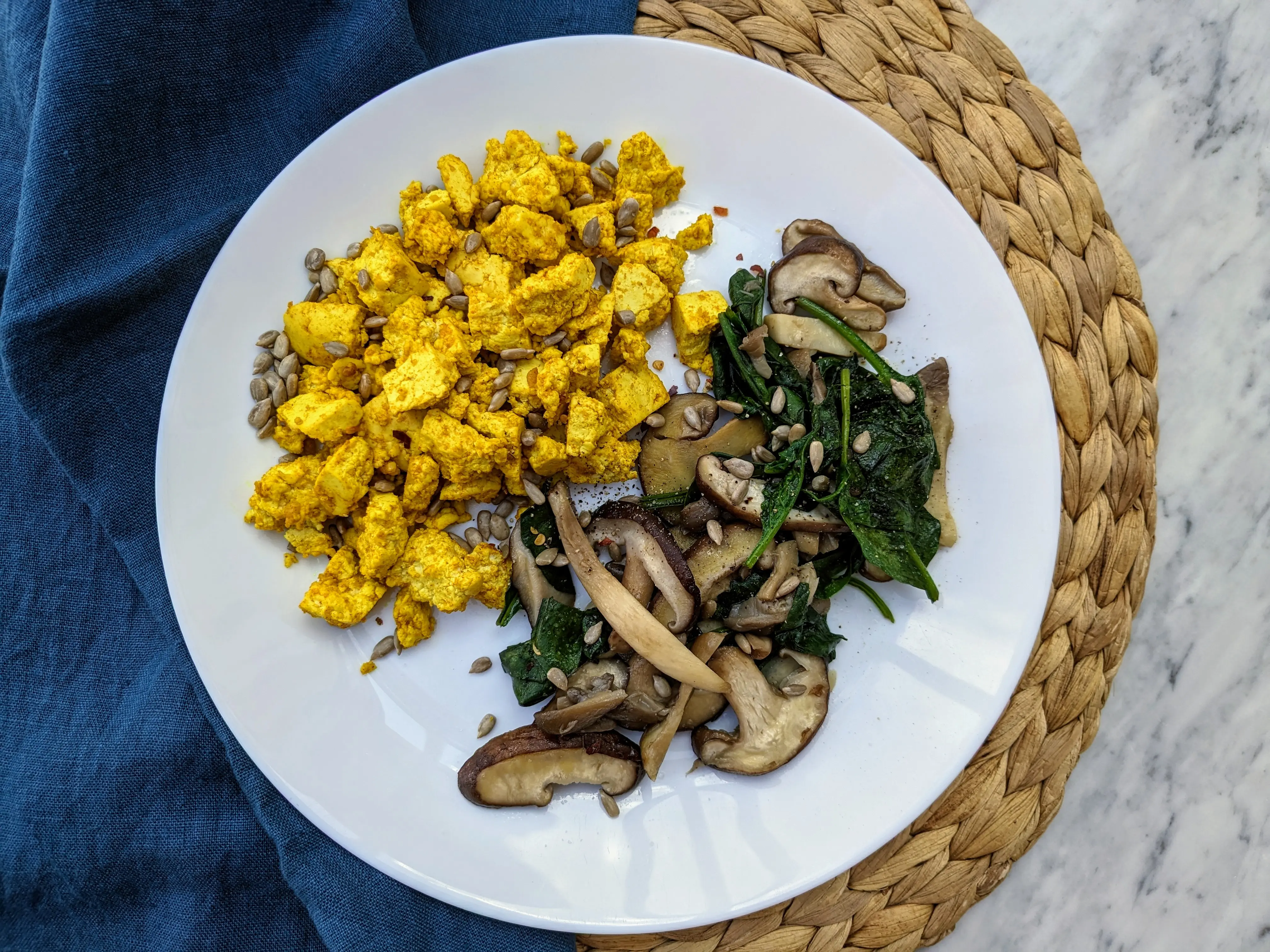 Vegan tofu scramble with spinach and mushrooms