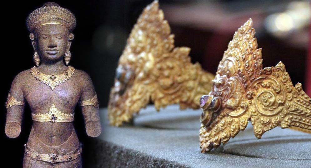 Intricate Angkorian gold crown and jewelry adorned with precious gemstones and traditional Khmer motifs.
