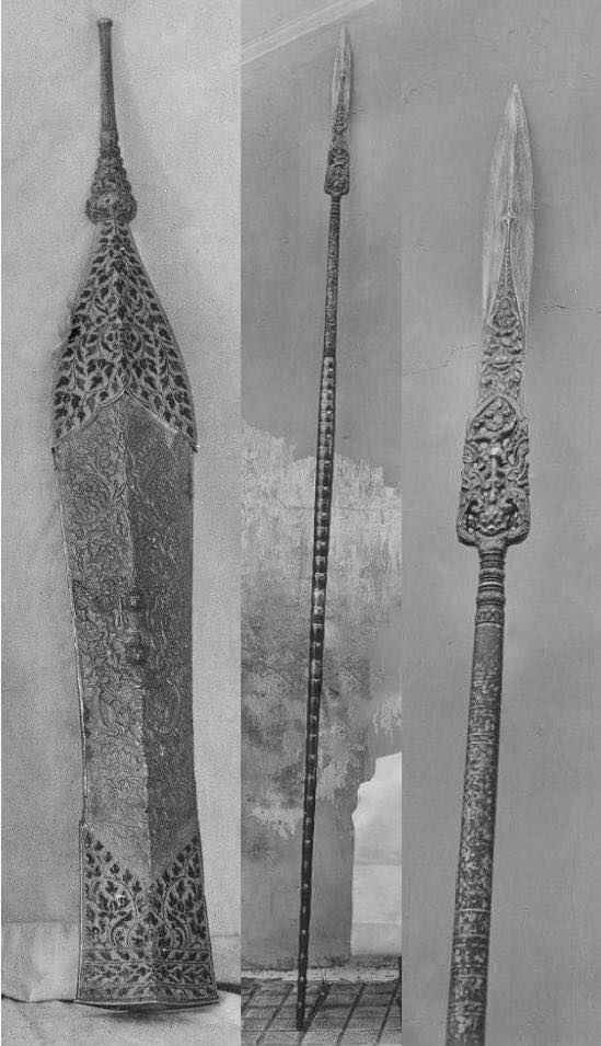 Close-up of Preah Lumpeng Chey blade with Rahu and floral carvings.