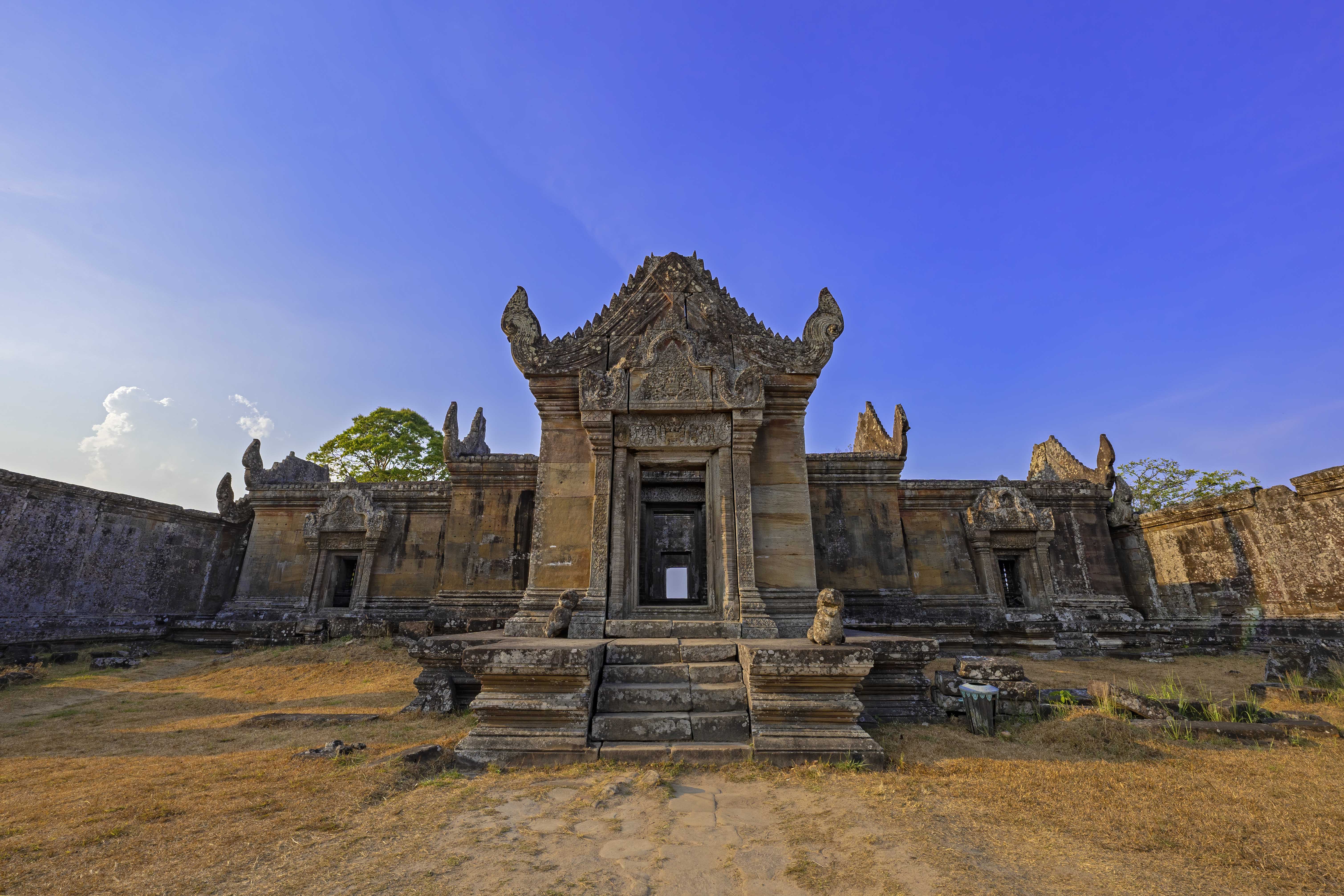 Detailed carving on the lintel of Preah Vihear Temple depicting Hindu deities.