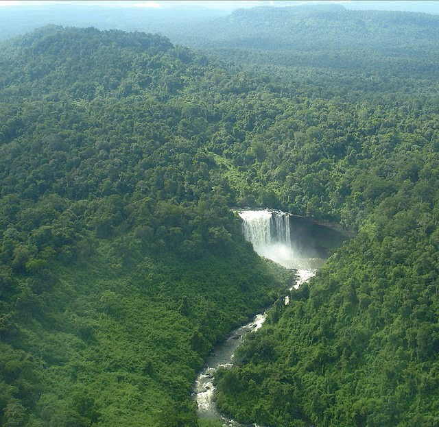 A hidden waterfall in the heart of the Cardamom Mountains with crystal clear water.