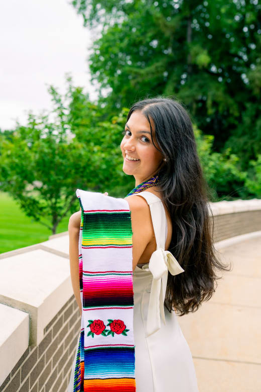 Graduate with a rose serape stole