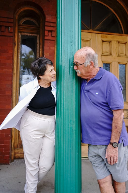 Couple by a historic doorway