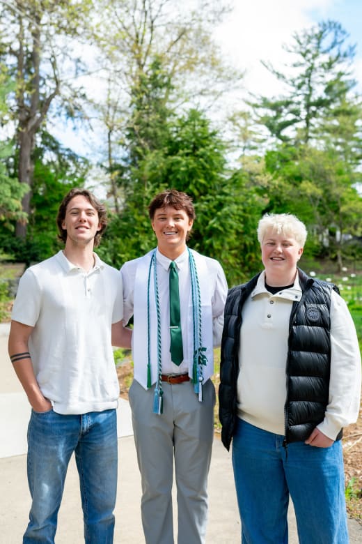 Three brothers in a garden