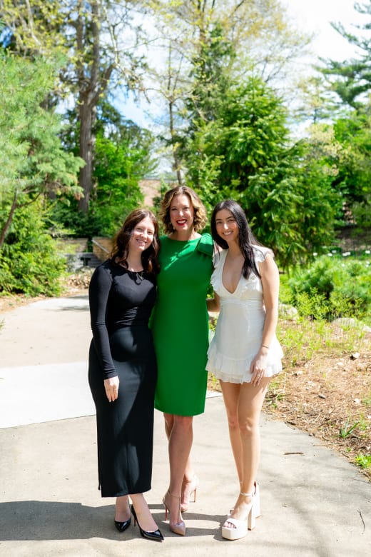 Three sisters on a garden path