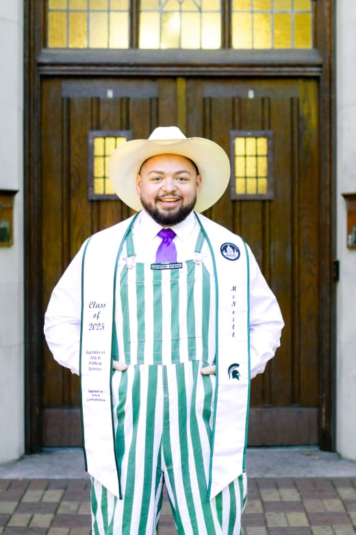 Graduate in cap and gown