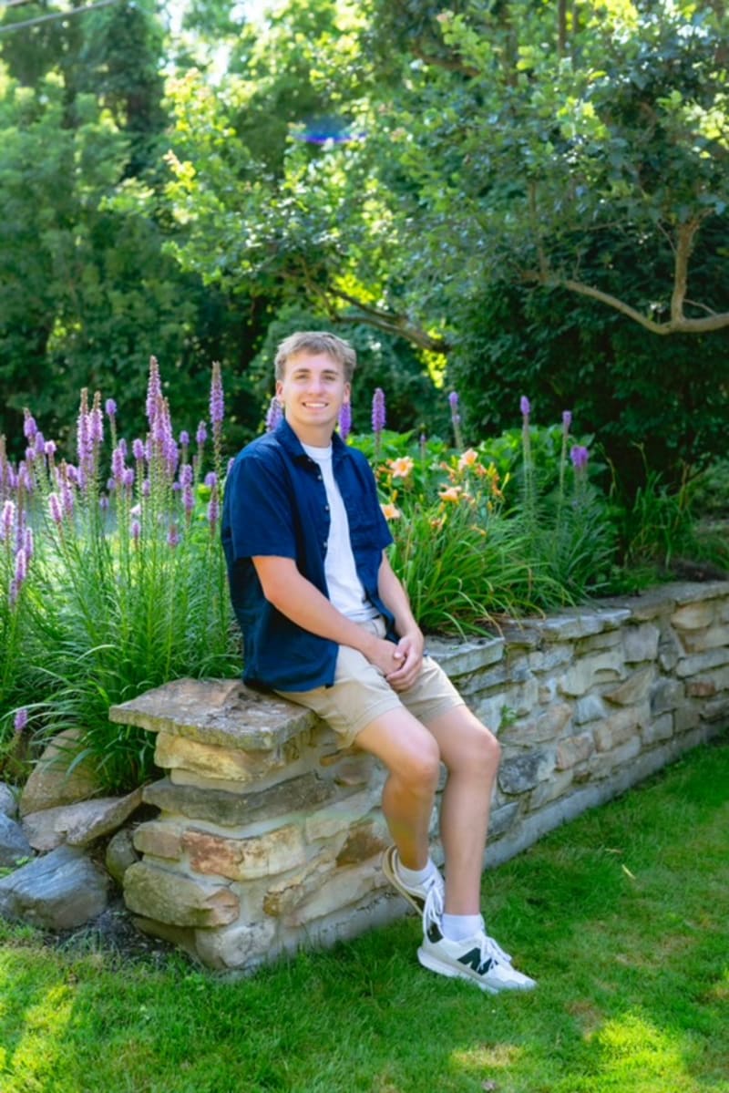 Indianapolis senior guy sitting outdoors