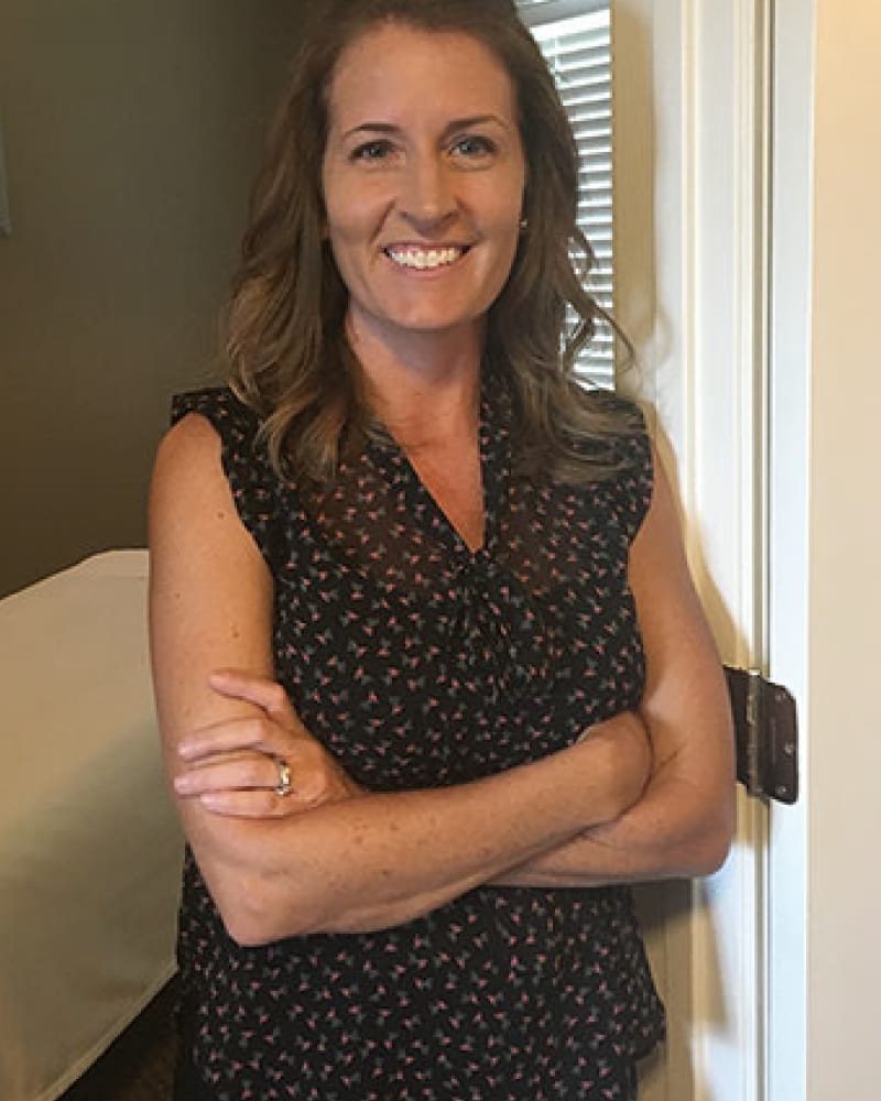 Teri, our Licensed Massage Therapist, in the massage room