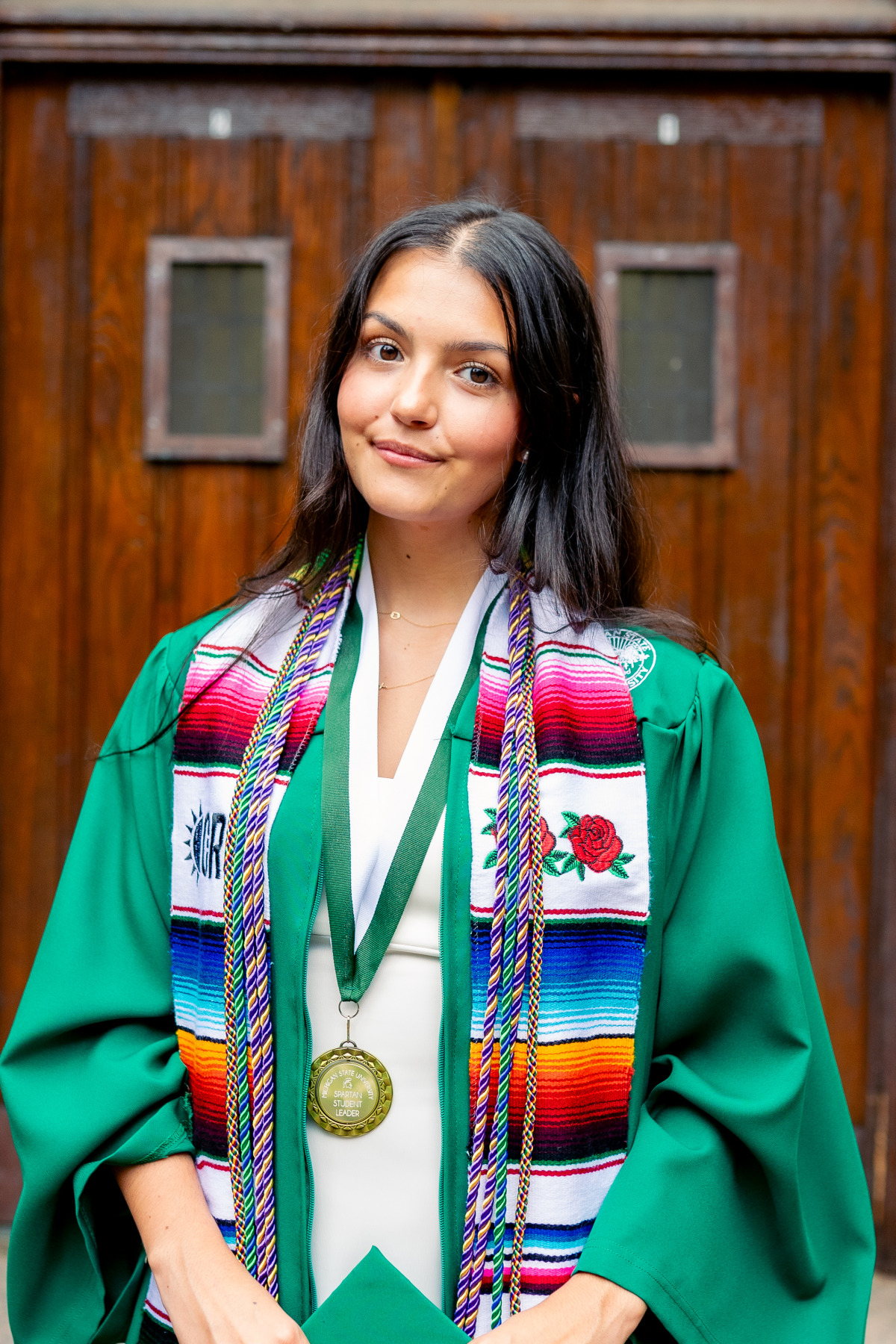 Graduate with colorful serape stole