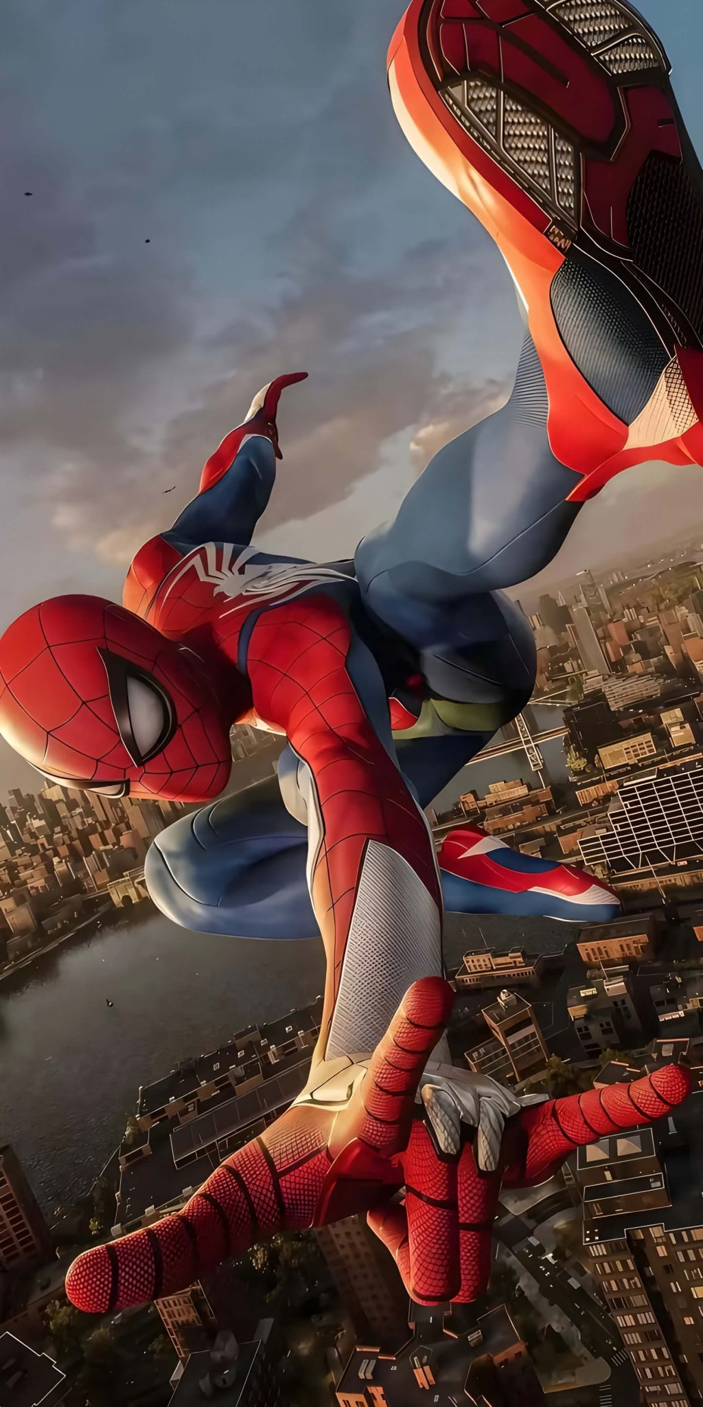 Red and blue superhero swinging above sprawling city skyline during dramatic sunset with clouds overhead and urban buildings