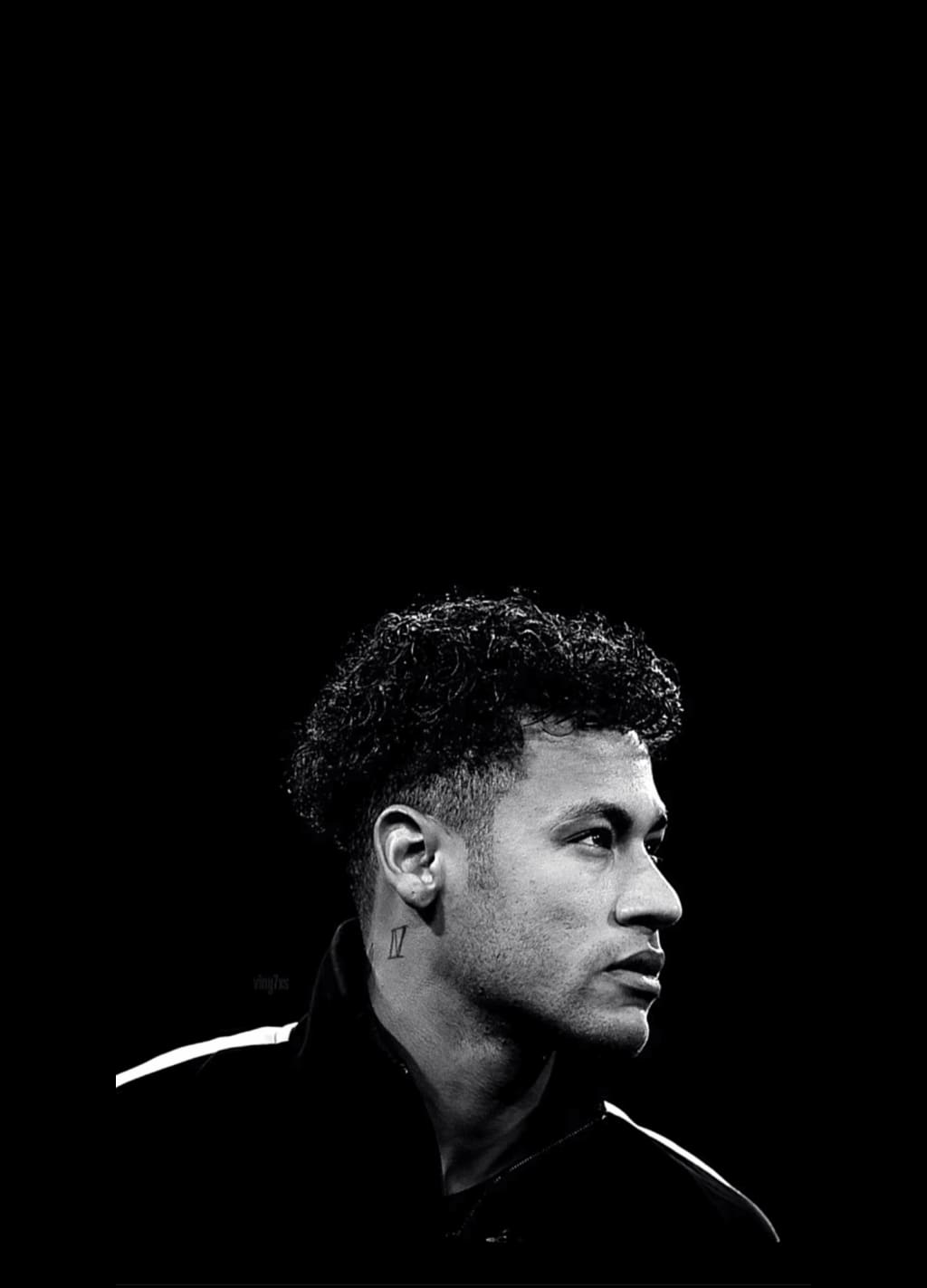 Neymar Jr in black and white profile portrait against dark background, dramatic side lighting with minimalist aesthetic.