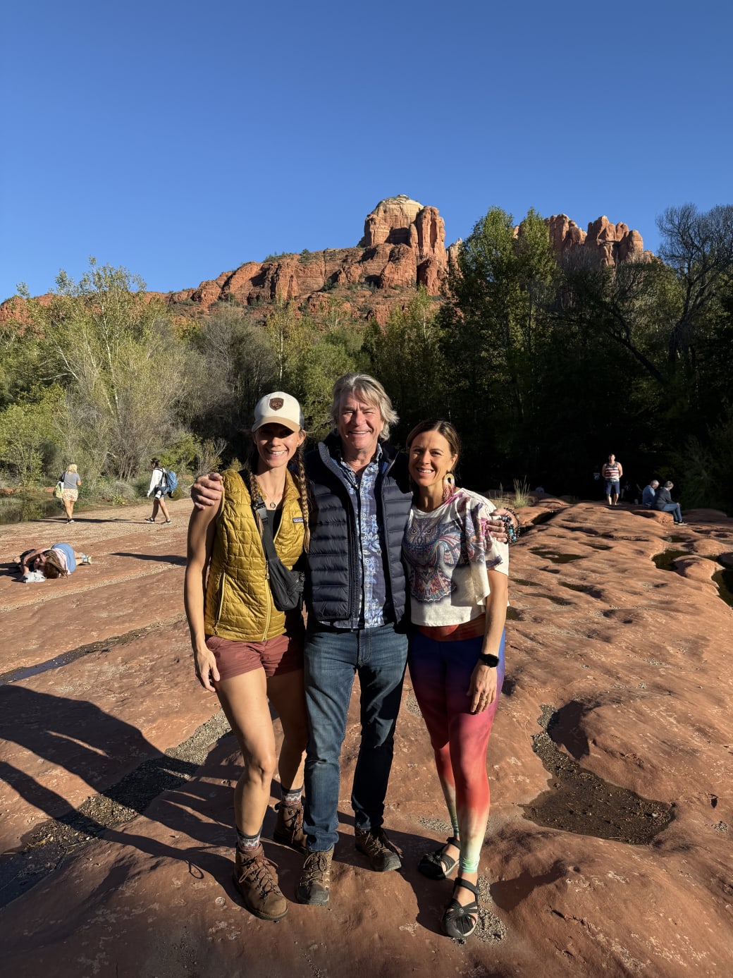 The Sedona retreat facilitators together in the red rocks