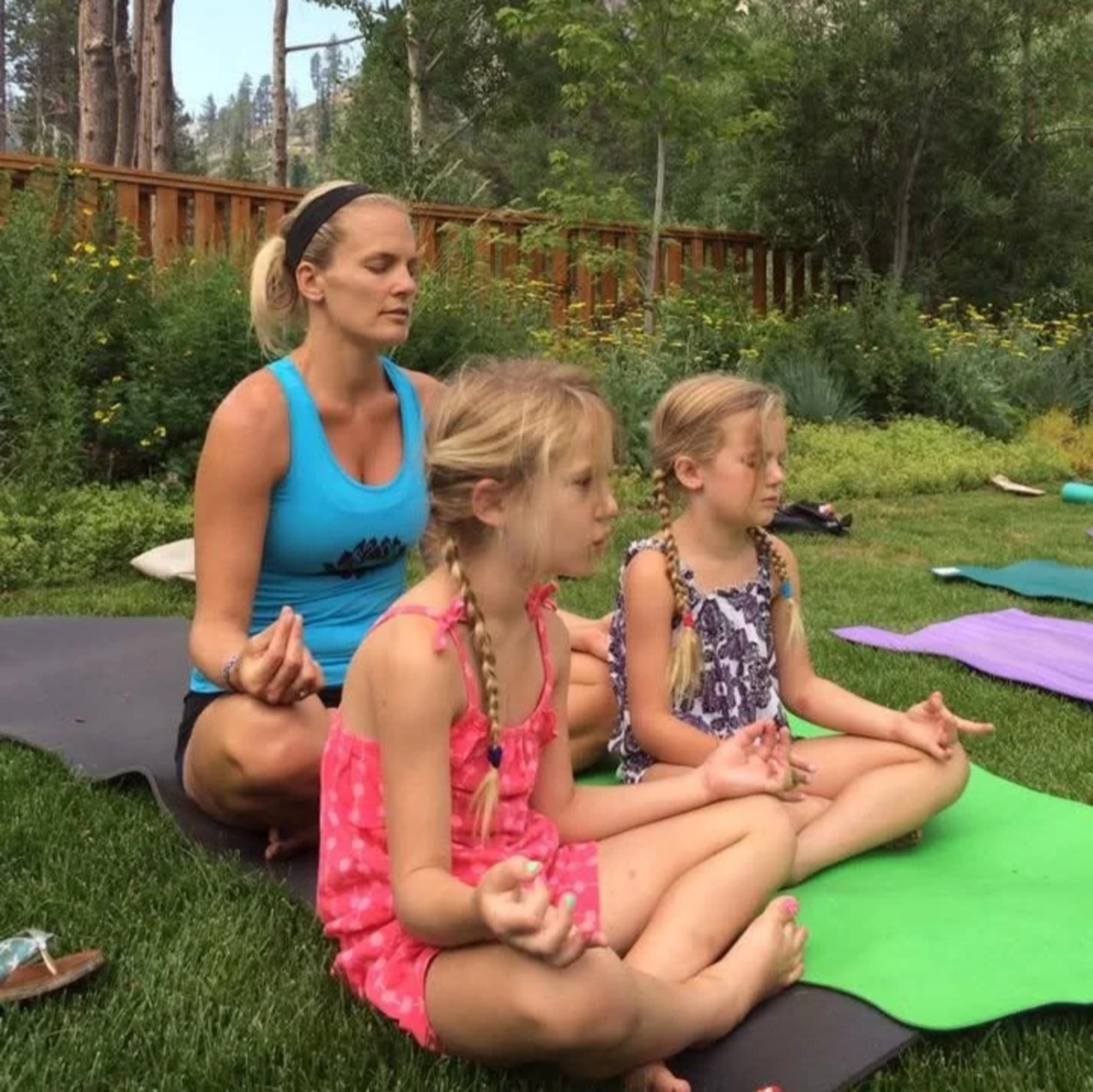 Becky Bradley teaching yoga with children