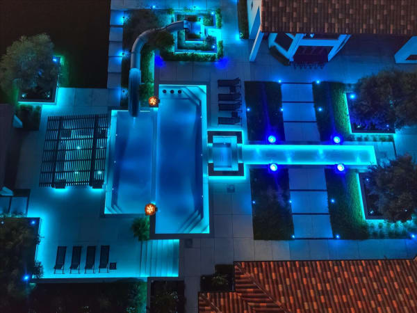 Chelshire Estates – aerial night view with LED pool lighting