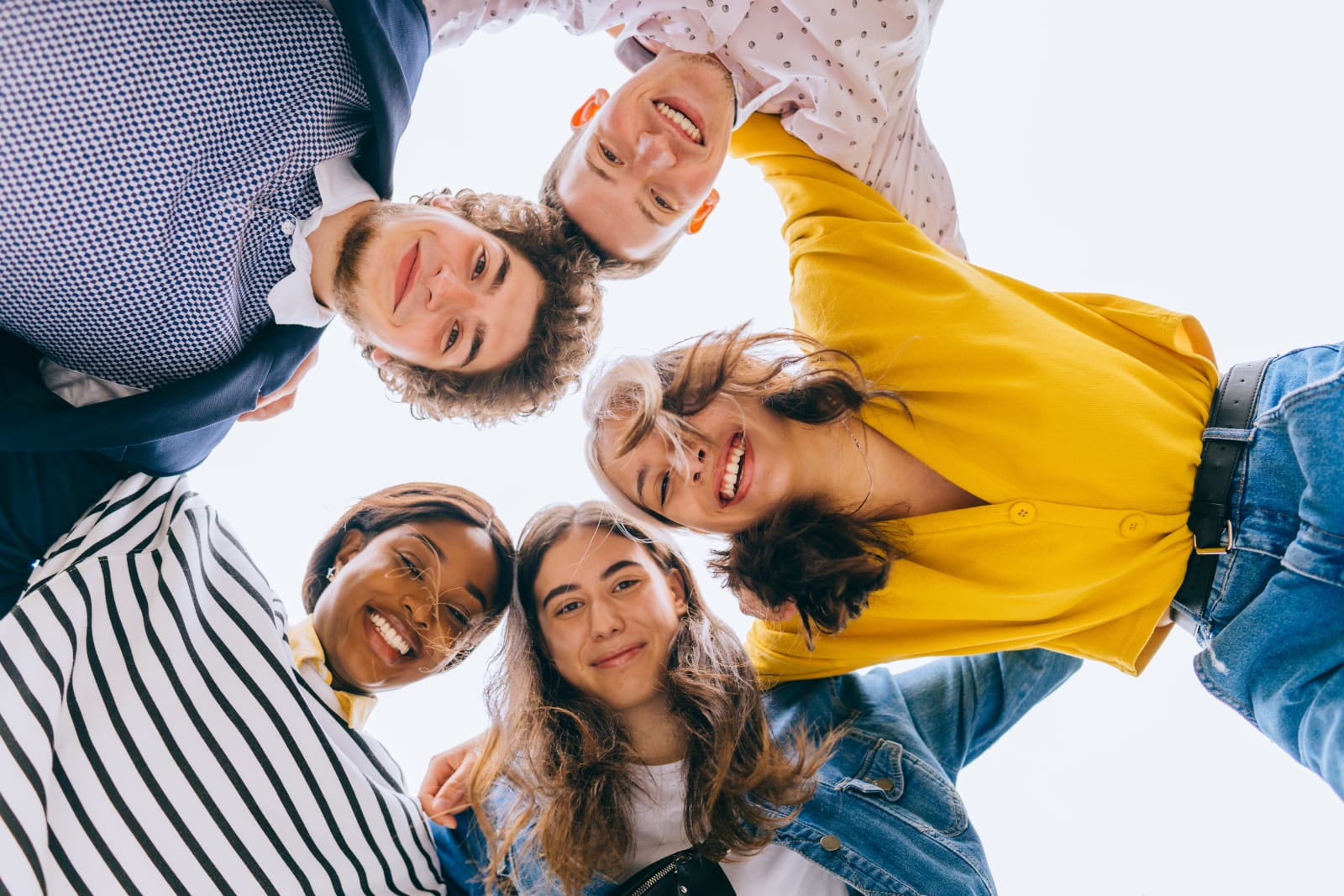 Young people smiling together, representing hope and community