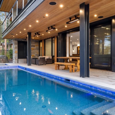 Covered pool with wood ceiling
