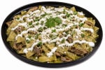 Chilaquiles con Bistec a la Parrilla o Pollo a la Parrilla.