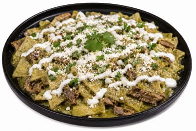 Chilaquiles con Bistec a la Parrilla o Pollo a la Parrilla.