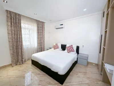 Kastina Luxury Suite at Aurora Smart Residence Abuja - elegant bathroom with modern fixtures