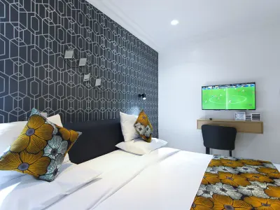 Osun Luxury Suite at Aurora Smart Residence Abuja - comfortable bedroom with luxury bedding