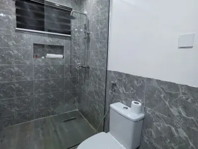 Kano Luxury Suite at Aurora Smart Residence Abuja - comfortable bedroom with luxury bedding