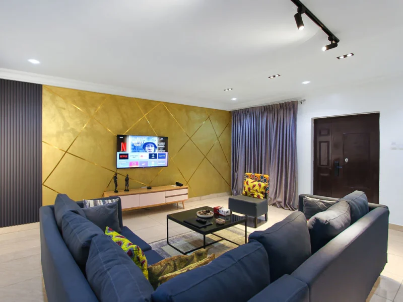 Osun Luxury Suite at Aurora Smart Residence Abuja - spacious living room with modern furniture
