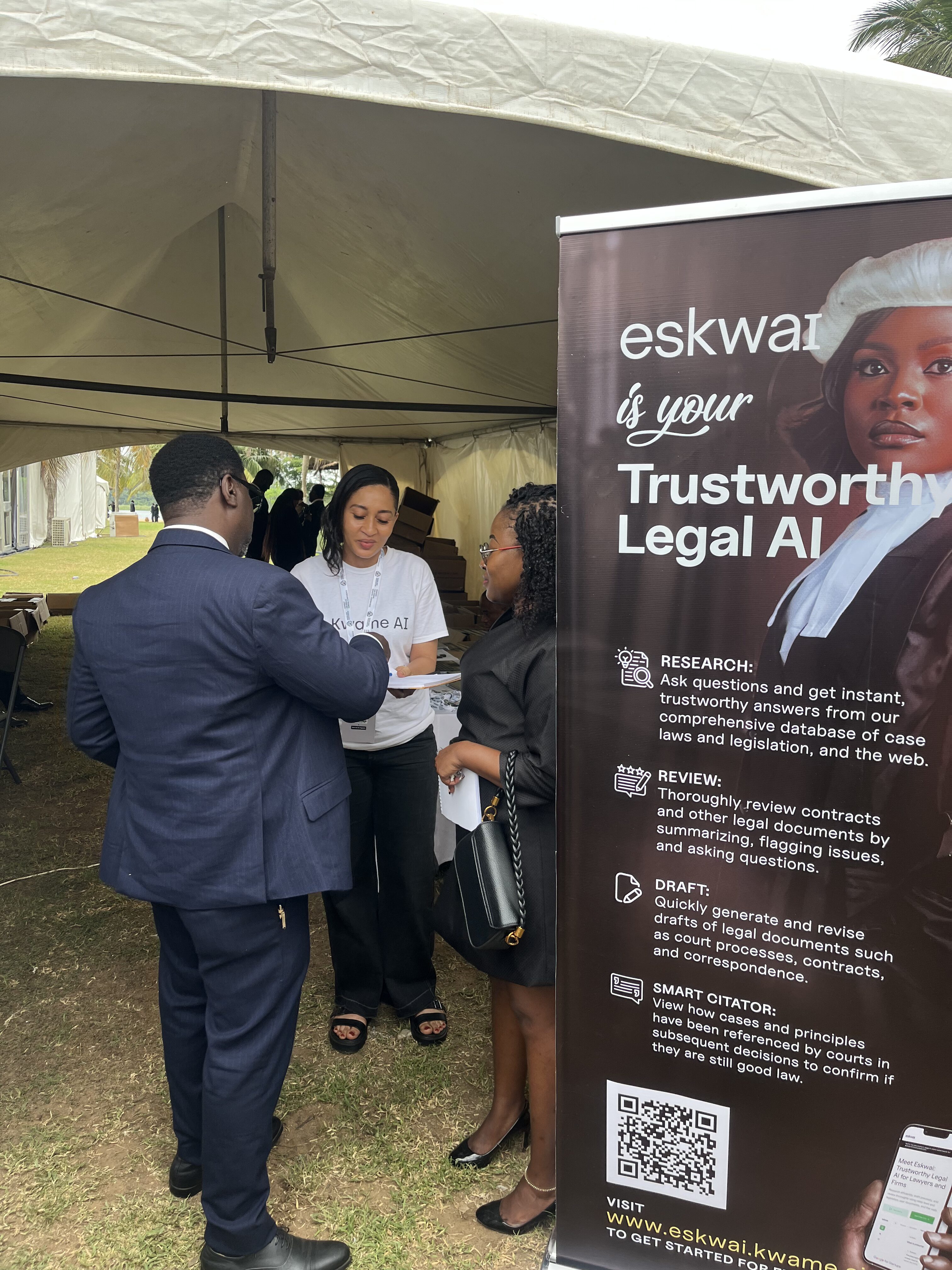Eskwai official speaking with two attendees at the Eskwai stand during the GBA Annual Conference 2026
