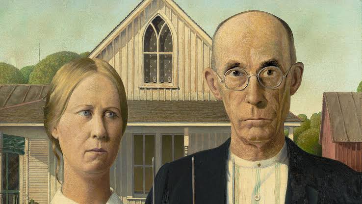American Gothic (1930) montre un homme et une femme devant une maison à fenêtre gothique. Contrairement à la légende, ce ne sont pas des époux fermiers. Qui sont-ils réellement ?