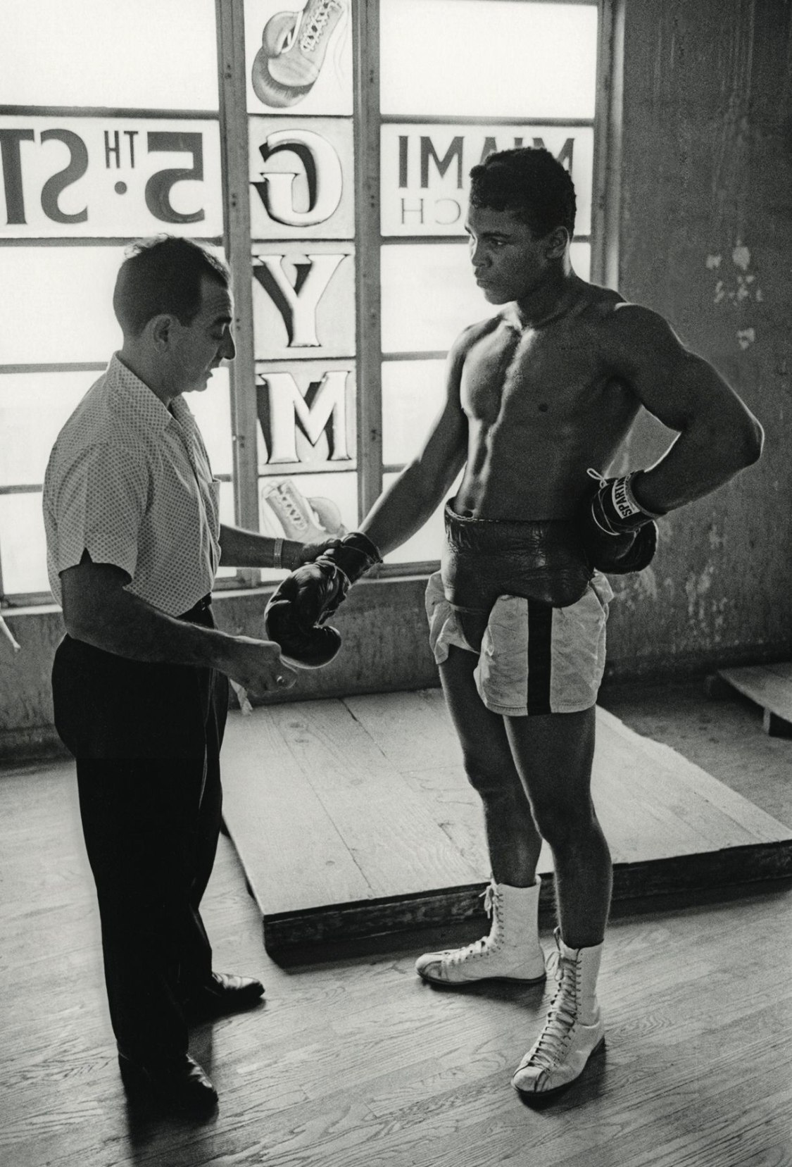 Cassius Clay (Muhammad Ali) , Marvin E. Newman